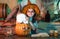 Kids Halloween celebration holiday. Funny witch with a pumpkin. Little Witch. Child in America celebrate Halloween.