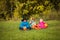 Kids in halloween costume play in nature, trick or treating