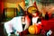Kids halloween. Halloween at home. Cheerful children in Halloween costumes and senior Devil with Witch hat posing with