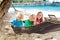 Kids in hammock. Children at tropical beach