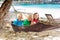 Kids in hammock. Children at tropical beach