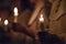 Kids are handling candles in the traditionall religious habit dresses in the church. Celebration of Lucia day in Sweden