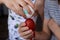 Kids hands playing with Easter eggs. Close up