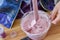 Kids have fun learning at home making slime in a creative science experiment