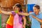 Kids have fun shooting water gun in group game