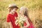 Kids having fun in field against nature background. Valentine. Sweet angel children. Valentines day cupid child