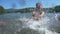 Kids having fun in sea together.