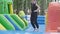 Kids jump at inflatable playground