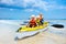 Kids kayaking in ocean. Children in kayak in tropical sea