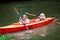 Kids kayaking in summer sport camp