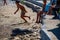 Kids look the friendly seal laying at Patitiri beach in Alonnisos island, Sporades, Greece