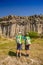 Kids looking at volcanic basalt coloumn