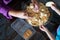 Kids making Kek Batik or Malaysian Triple Chocolate Dessert. Doing the initial steps, crushing the cookies into tiny pieces