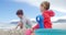 Kids making making sand castle at beach