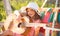Kids music and songs. Child musician playing the guitar like a rockstar. Happy cute teen girl swinging and having fun