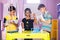 Kids noting down chemicals from falsk by checking at chemistery laboratory - concept of learning reagent reaction, education and