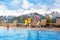 Kids in outdoor swimming pool of Alpine resort