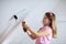 Kids painting attic wall. Home improvement