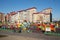 Kids with parents play on a public playground in a residential area of â€‹â€‹Krasnoyarsk on a sunny autumn day