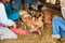 Kids petting piglets