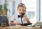 Kids, phone call and a girl playing in an office as a fantasy businesswoman at work on a laptop. Children, telephone and