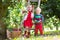 Kids picking cherry on a fruit farm