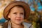 Kids play in autumn park. Children portrait with yellow leaves. Dreamy kids face. Daydreamer child portrait close up