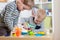 Kids Play Modeling Plasticine, Children Mold Colorful Clay Dough. Preschooler Playing Together