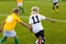 Kids Play Soccer Game. Children Outdoor Football Tournament Match on Grass Field