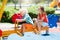 Kids on playground. Children play in summer park.