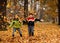 Kids playing in autumn park