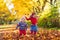 Kids playing in autumn park