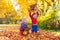 Kids playing in autumn park