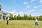 Kids Playing Badminton in Front Yard