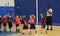 Kids playing basketball match