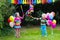 Kids playing with birthday pinata