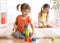 Kids playing block toys in playroom at nursery