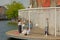 Kids playing on `The floating Island`, an art installation in the historic center of Bruges by Obba, part of the Bruges triennial