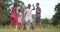 Kids playing with garden sprinkler