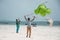 Kids playing with handmade kites, Zanzibar