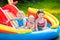 Kids playing in inflatable swimming pool