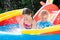 Kids playing in inflatable swimming pool