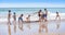 Kids playing with old surfboard, Taghazout surf village, agadir, morocco