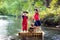 Kids playing pirate adventure on wooden raft