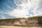 Kids playing on the sand dunes at the beach, Coffs Harbour Australia