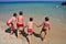 Kids playing on the Scoglio di Peppino beach