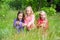 Kids playing on summer meadow