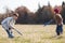 Kids playing tennis outside