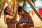 Kids playing under beach shower