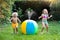 Kids playing with water ball toy sprinkler